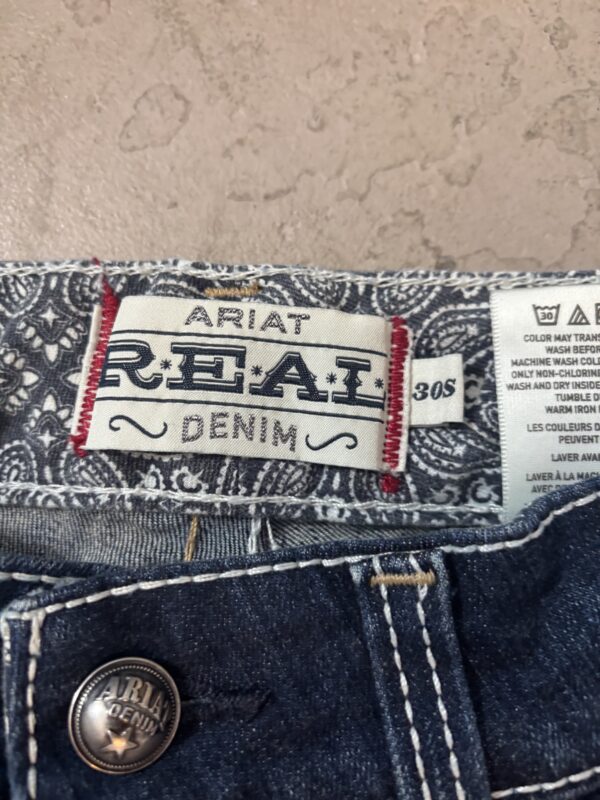 IMG_1984 R.E.A.L. Mid Rise Stretch Whipstitch Boot Cut Jean Short, 30"