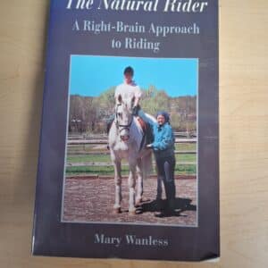 Book cover of The Natural Rider by Mary Wanless showing riding posture guidance