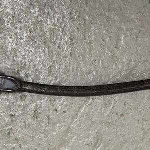 Rolled leather bucking and balance strap attached to saddle D-rings